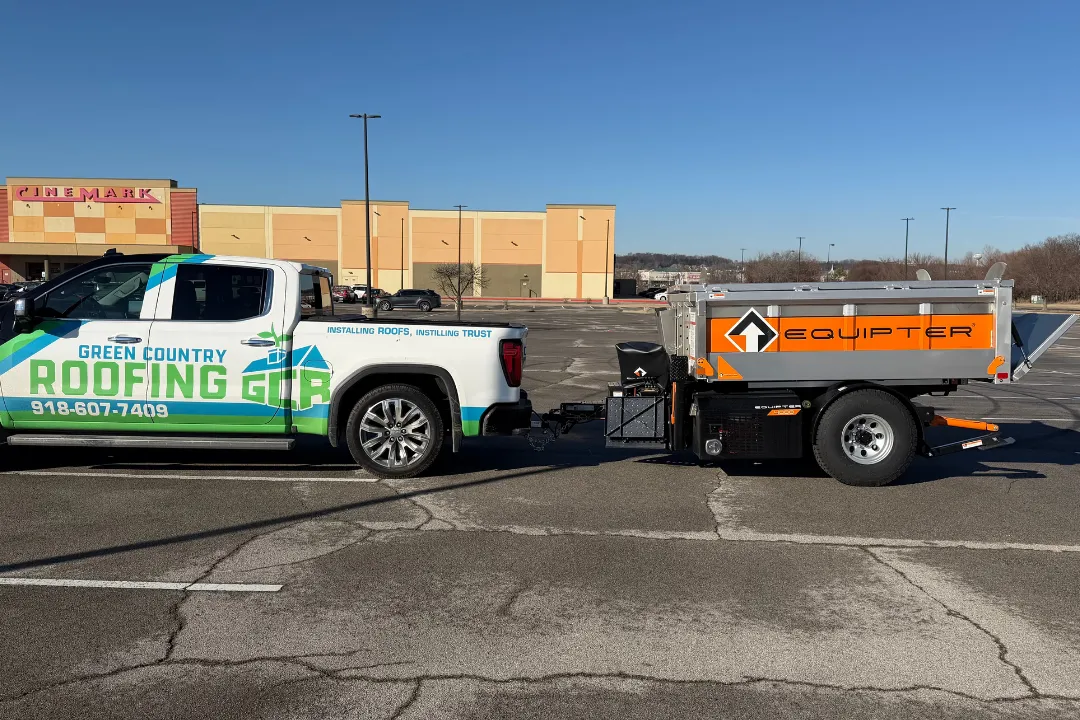 Full GCR truck wrap + Equipter RB4000 trailer — Green Country Roofing, 918-607-7409, Installing Roofs Instilling Trust, license number visible, Tulsa Cinemark background