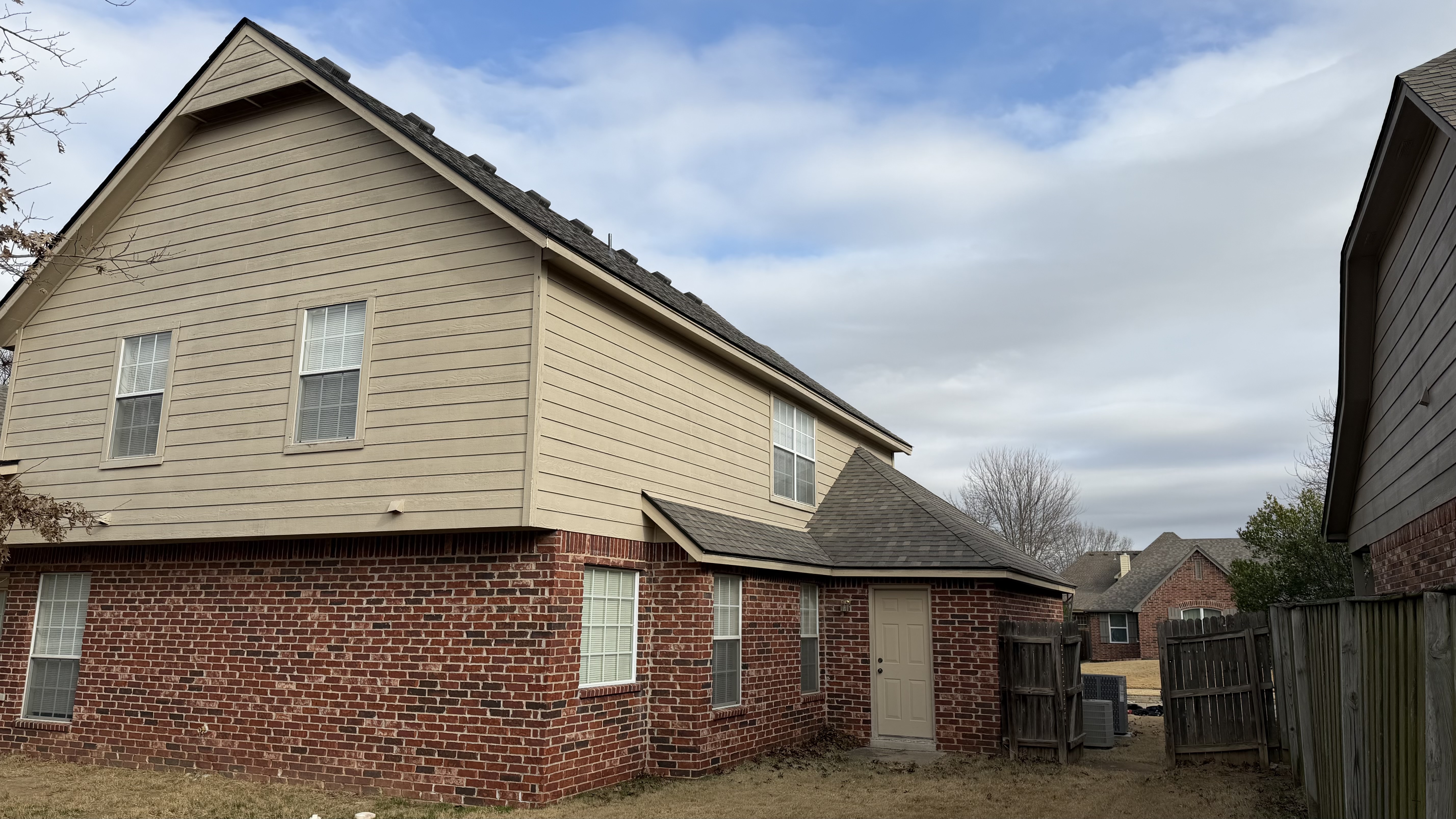 Completed two-story roof — secondary pitch example