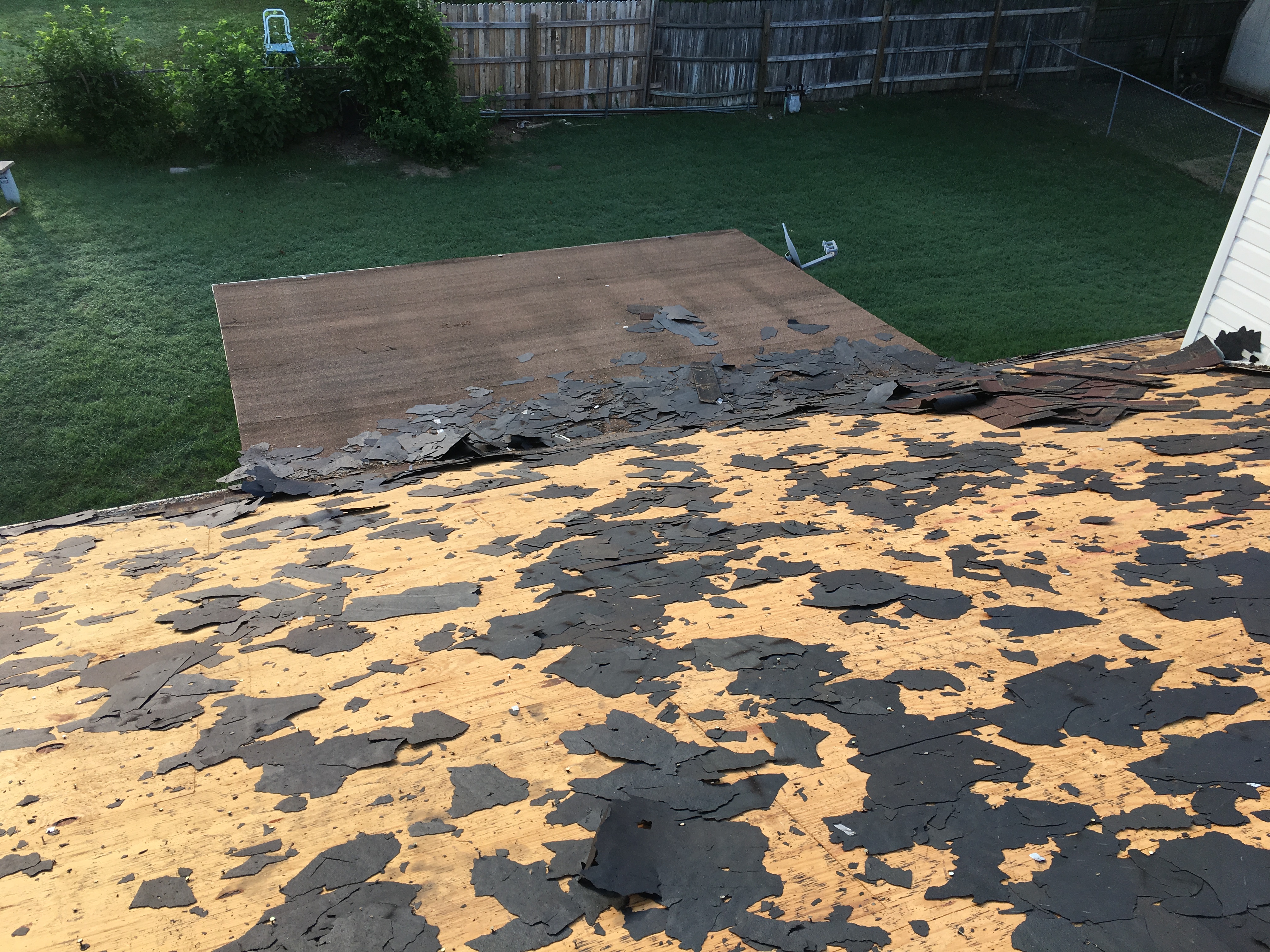 Decking exposed during tear-off — ties to layers and decking condition sections