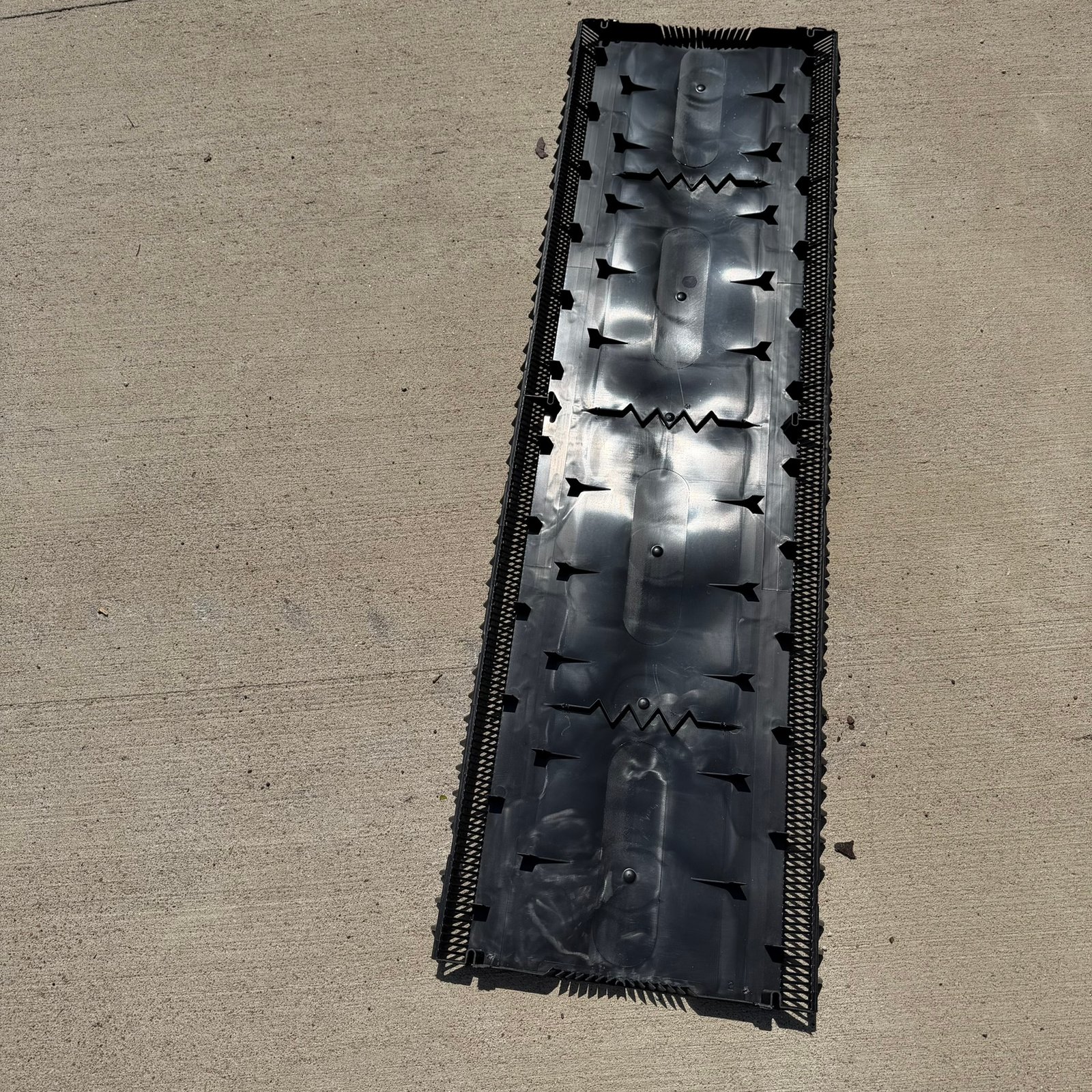 Ridge vent with filter removed showing internal baffle system from back side