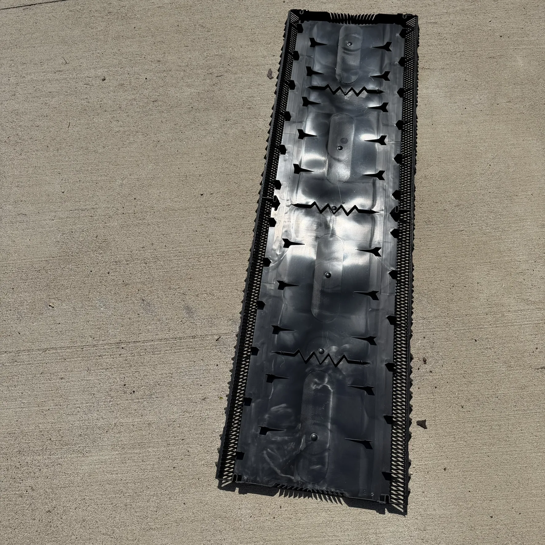 Ridge vent with filter removed showing internal baffle system from back side