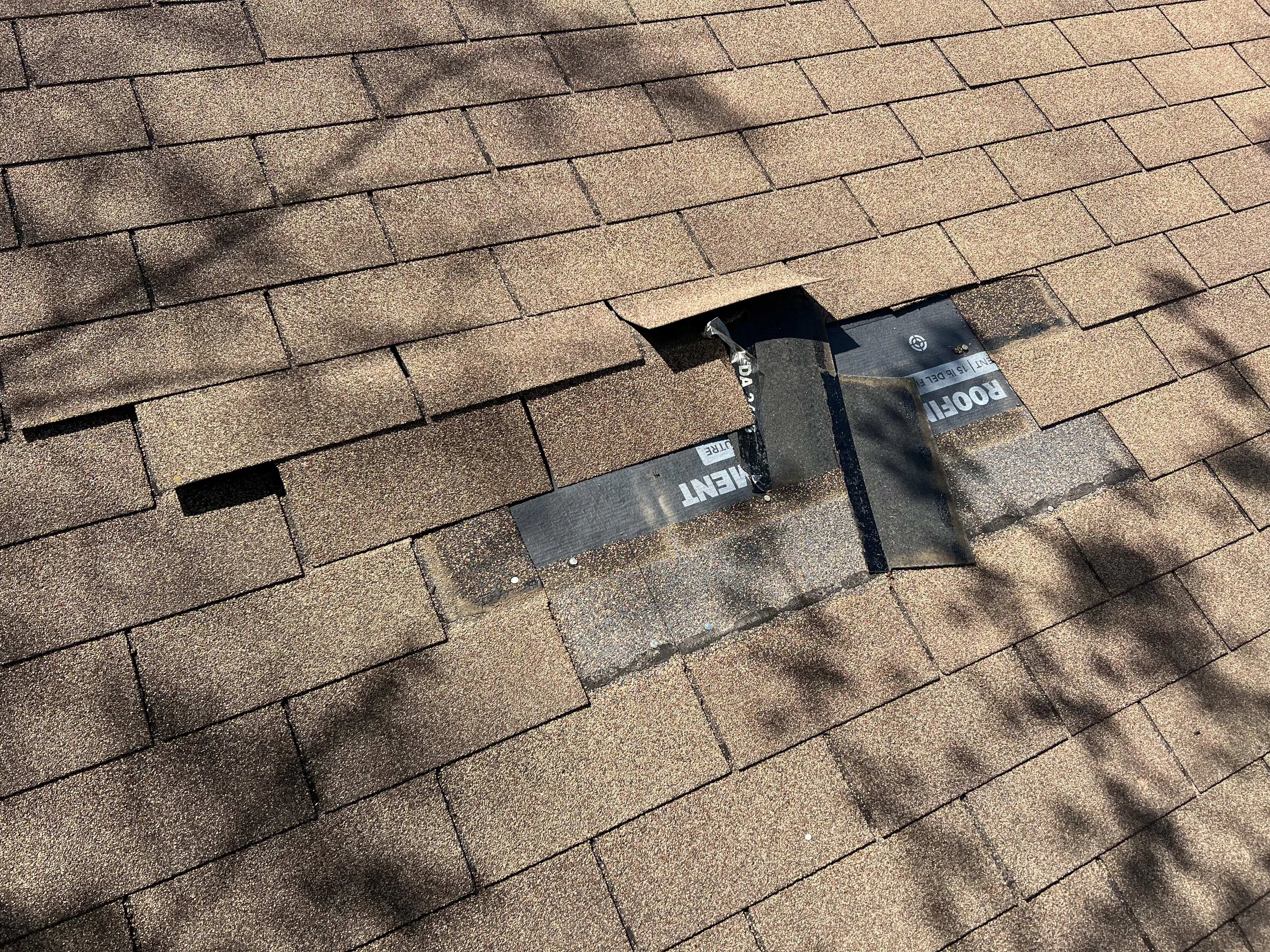 Missing shingles, exposed underlayment, bad patch job — instantly reads as storm damage/claim needed