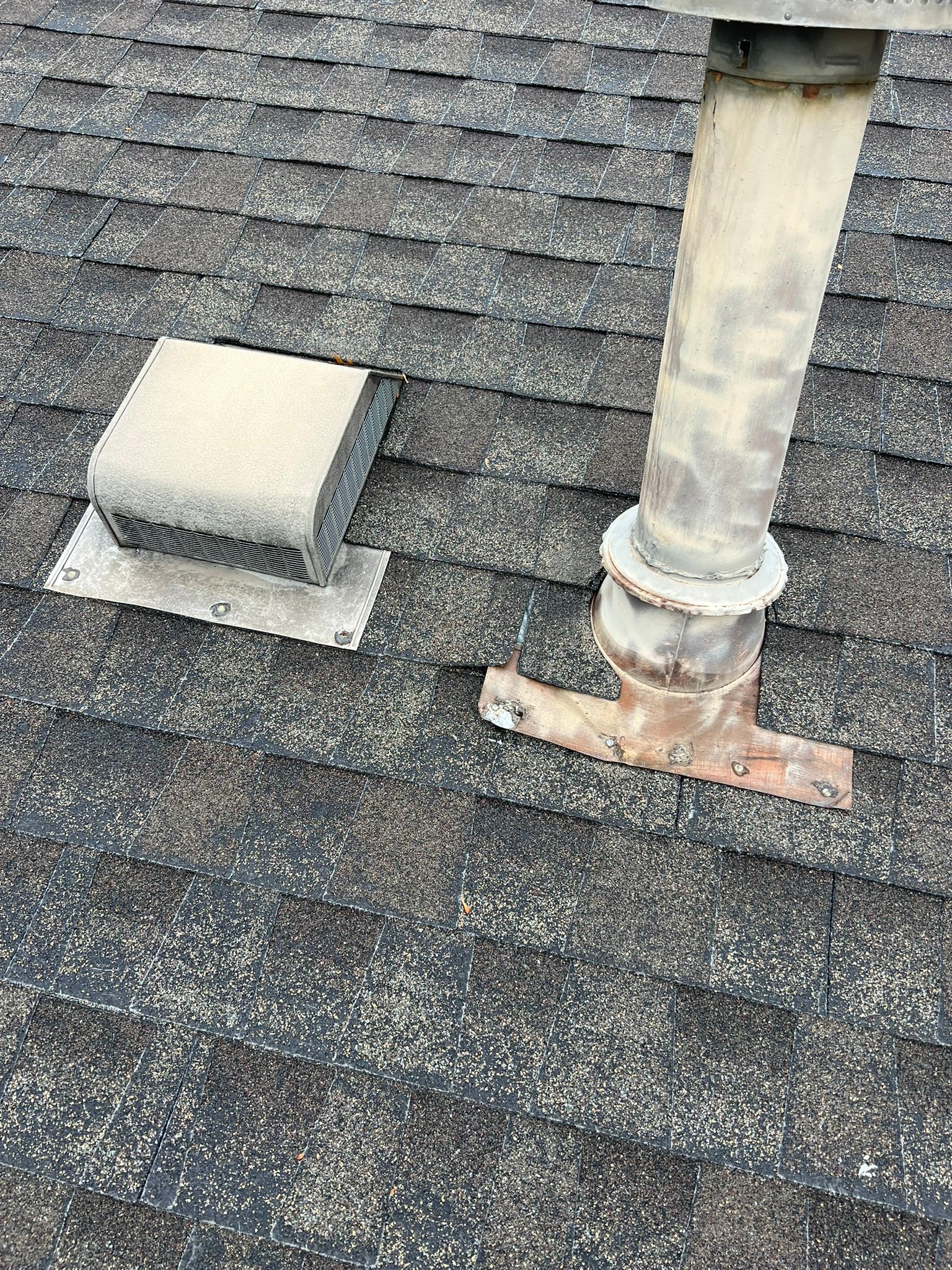 Failed pipe boot next to exhaust cap — common repair homeowners call about