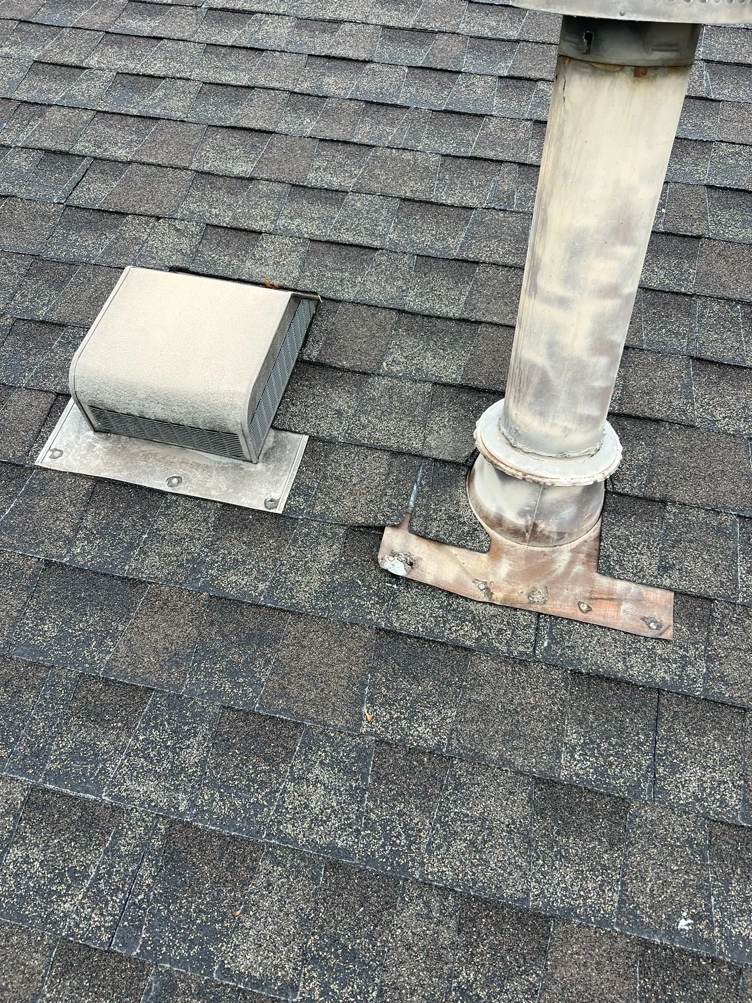 Failed pipe boot next to exhaust cap — common repair homeowners call about