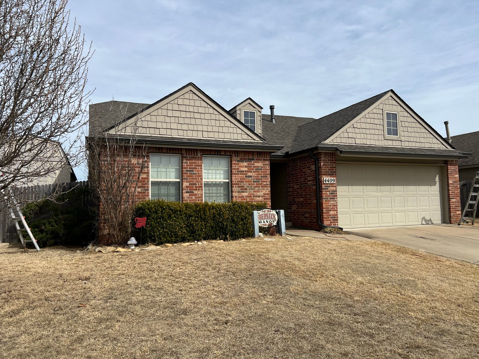 Finished GCR roof on brick home with double gable, real Tulsa job site
