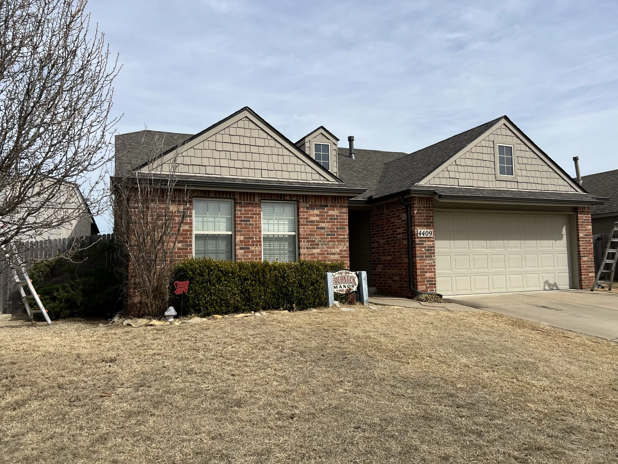  Finished GCR roof on brick home with double gable, real Tulsa job site