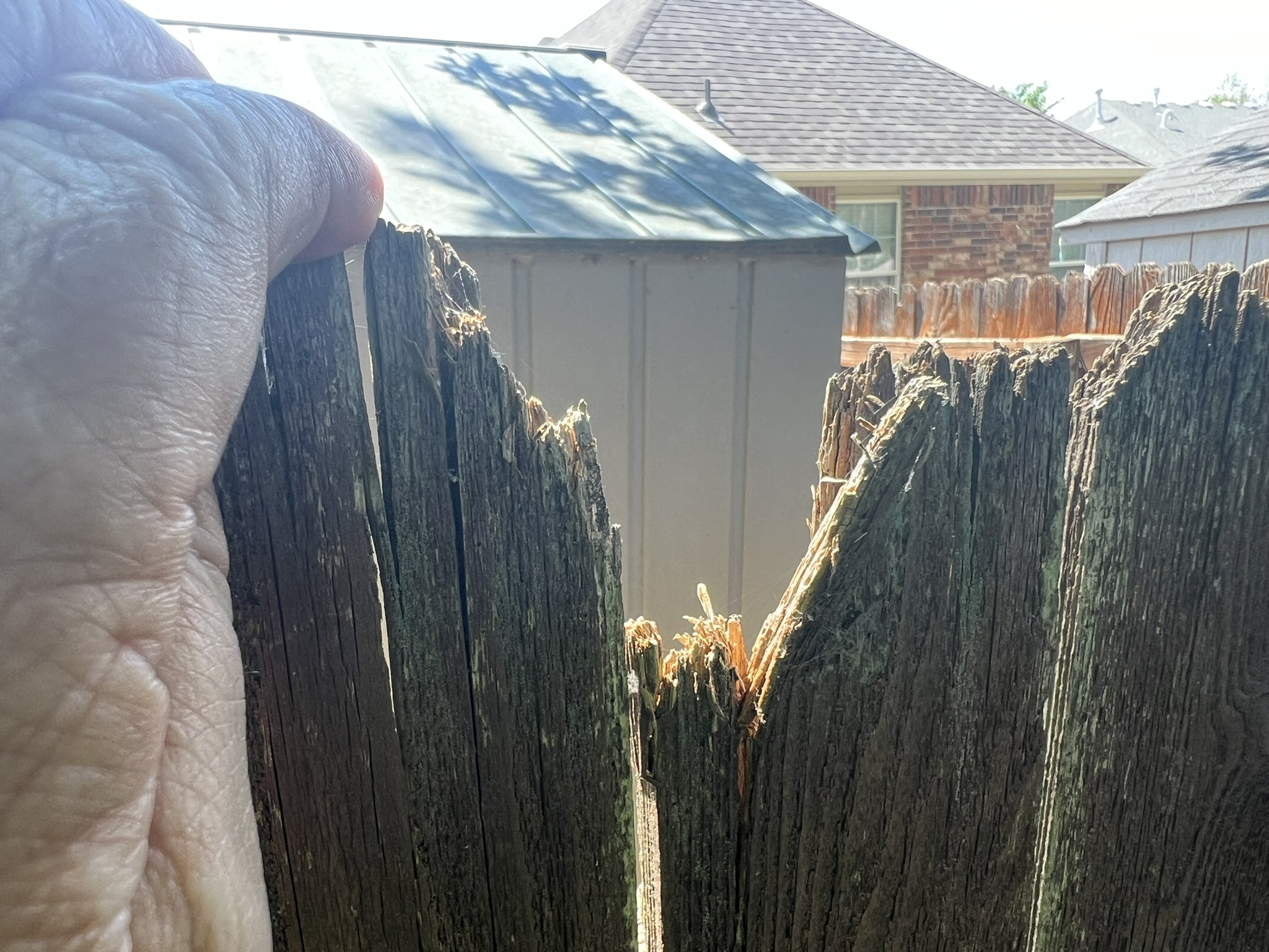 Storm damaged fence after Oklahoma hail storm — document everything