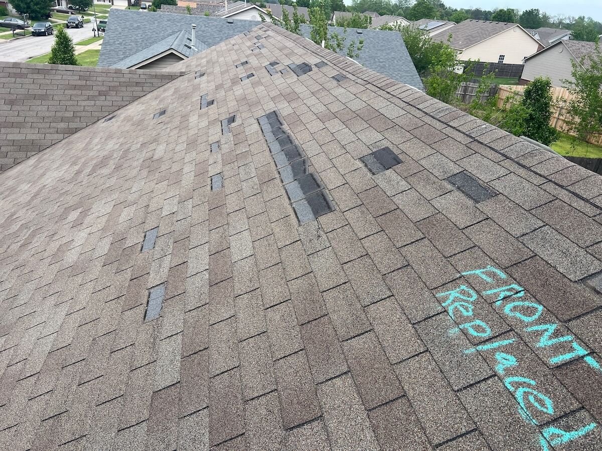 Wind damage on a Tulsa roof