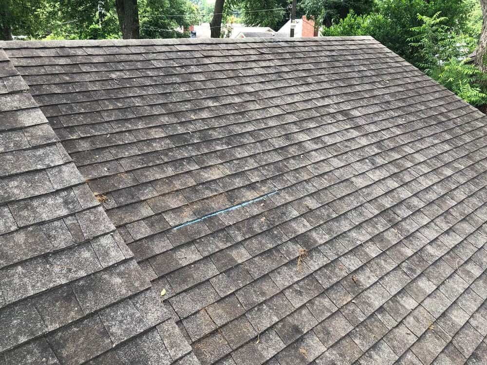 what-are-the-black-marks-on-my-roof-green-country-roofing